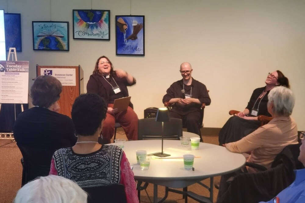 Participants interact at Interfaith Tuesday Tabletalk